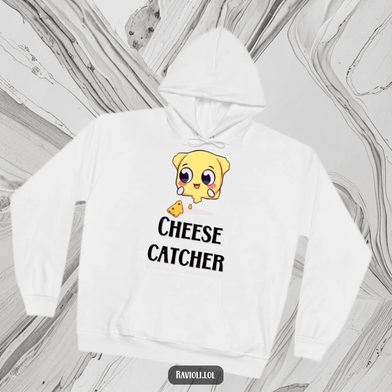 Funny hoodie showing a ravioli character with wide, expressive eyes attempting to catch a shower of cheese, combining warmth and humor.