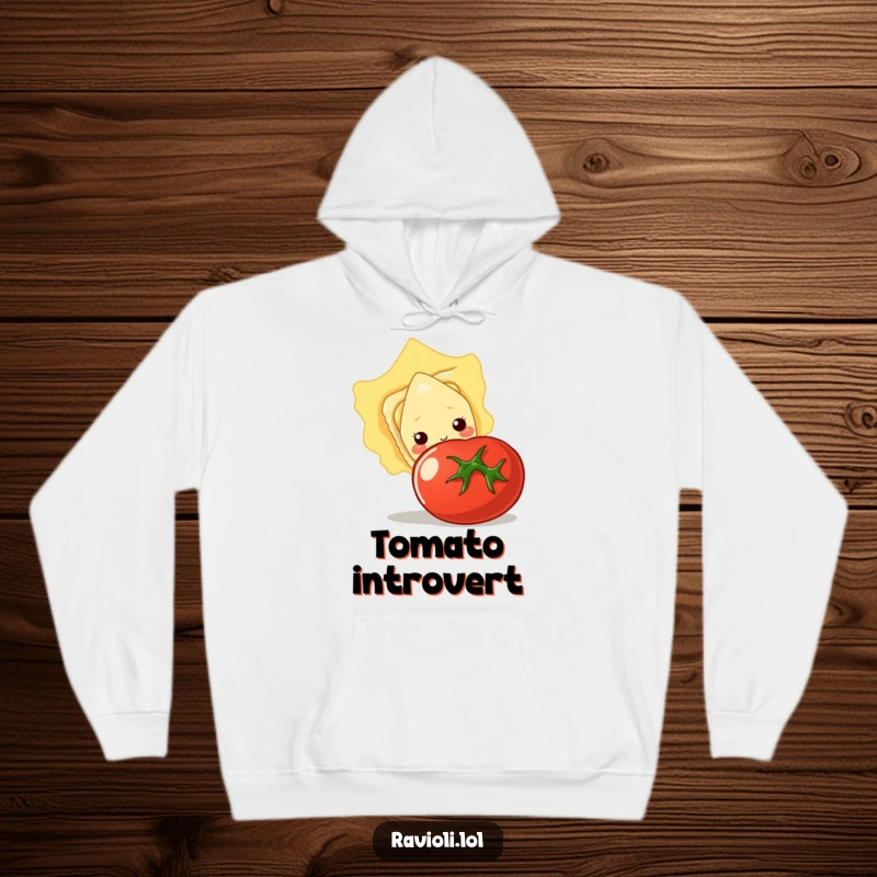 Funny hoodie featuring a shy ravioli peeking from behind a big tomato, offering cozy and humorous comfort.